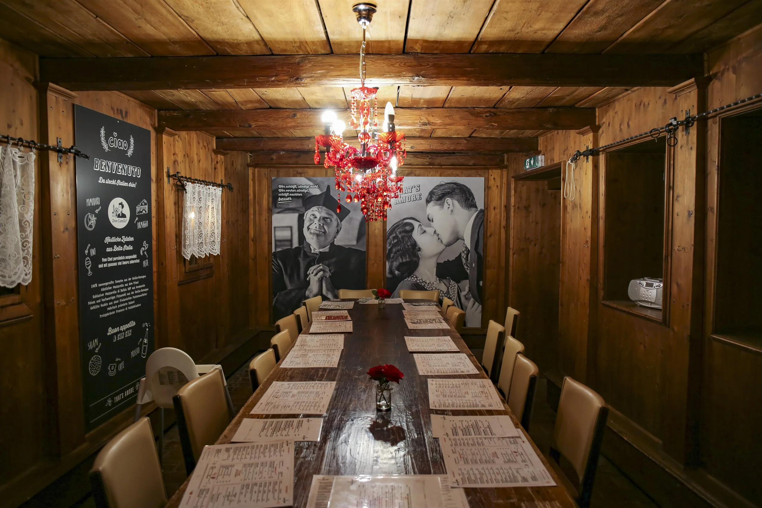 A laid table in the restaurant with wine glasses and cutlery